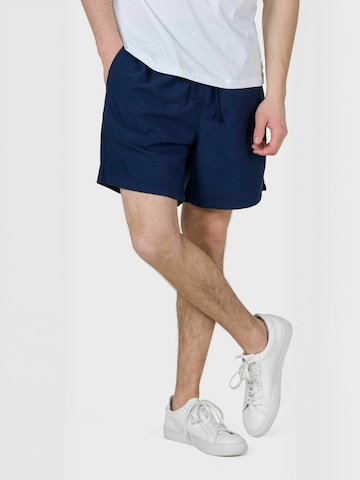Pantaloni ' Bertram ' de la Klitmøller Collective pe albastru: față