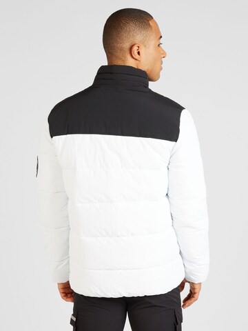 ELLESSE Демисезонная куртка в Белый