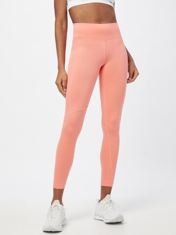 Reebok Skinny Workout Pants in Orange: front