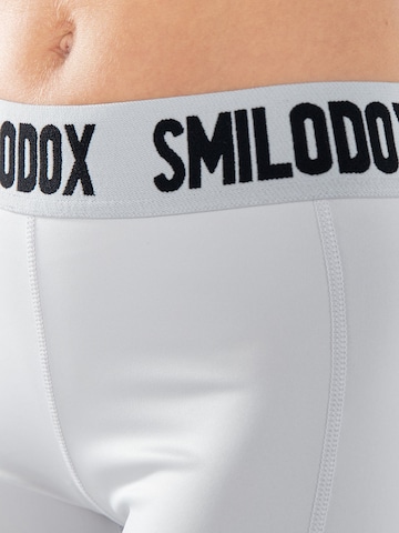 Skinny Pantalon de sport Smilodox en gris