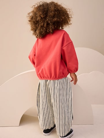 Set Next en rouge