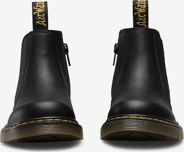 melns Dr. Martens Zābaki