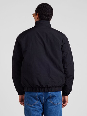 Tommy Jeans - Casaco meia-estação 'ESSENTIAL' em preto