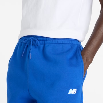new balance Tapered Broek 'Essentials' in Blauw