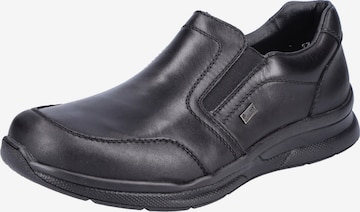 Rieker Slip-ons in Black: front