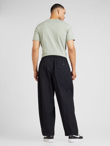 Nike Sportswear - Loosefit Pantalón 'CLUB' en negro