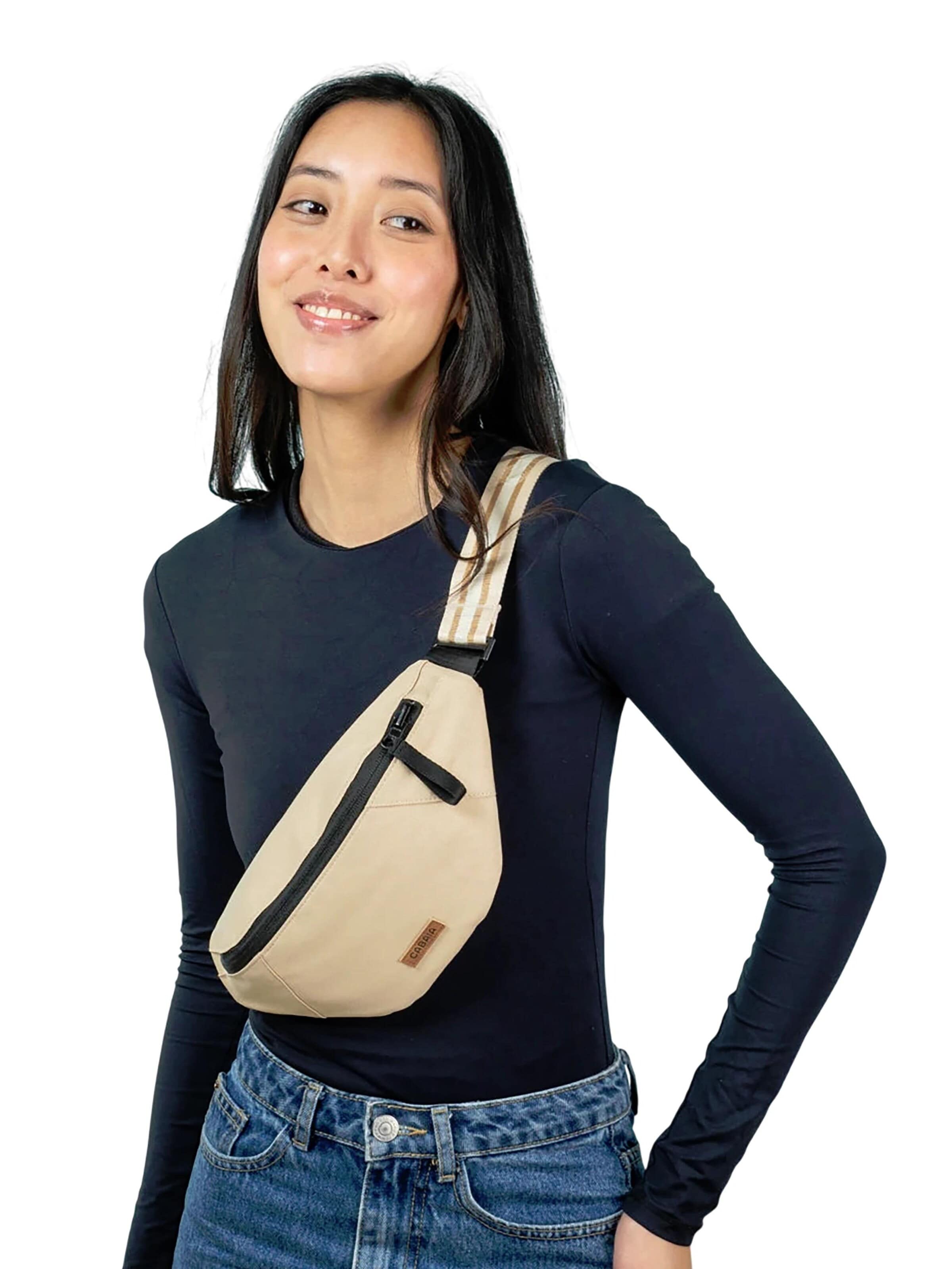 Cabaia Fanny Pack '2IN1 Small Lobito' in Beige: front