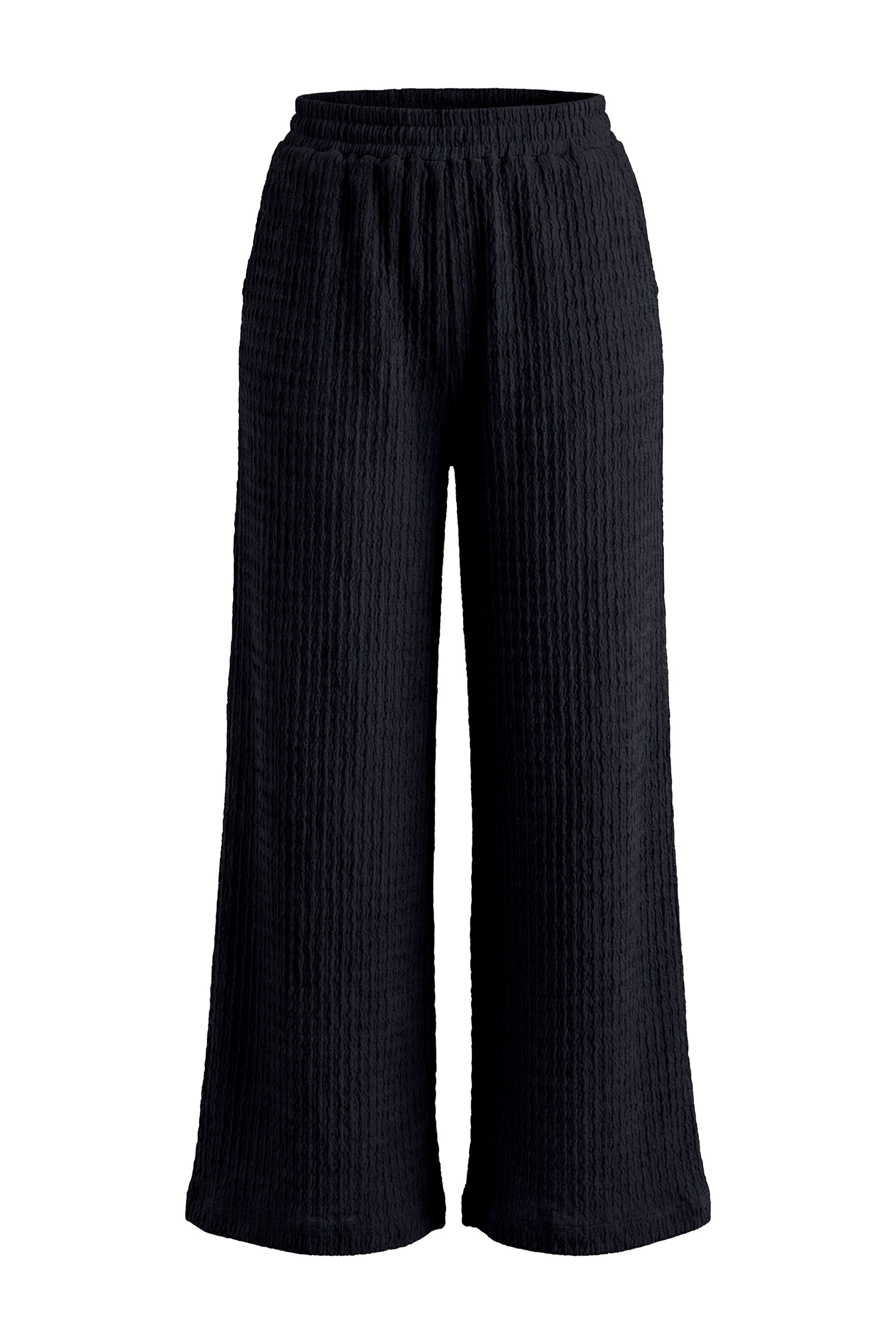 Studio Untold Loosefit Hose in Schwarz: Vorderseite