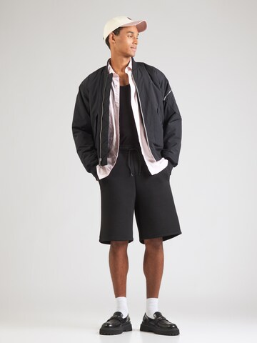 WEEKDAY Loose fit Trousers in Black