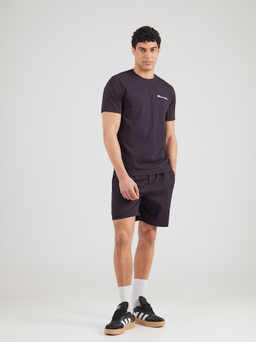 Survêtement Champion Authentic Athletic Apparel en noir : devant