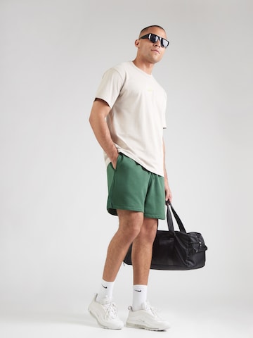 Nike Sportswear Szabványos Nadrág 'Club' - zöld