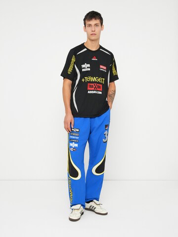 ADIDAS ORIGINALS - Loosefit Pantalón 'Teamgeist' en azul