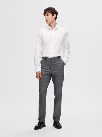 SELECTED HOMME Slimfit Chino hlače 'Robert' | modra barva