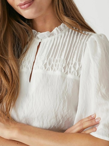 Chemisier 'Molly' co'couture en blanc