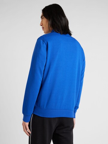 Champion Authentic Athletic Apparel - Chándal en azul