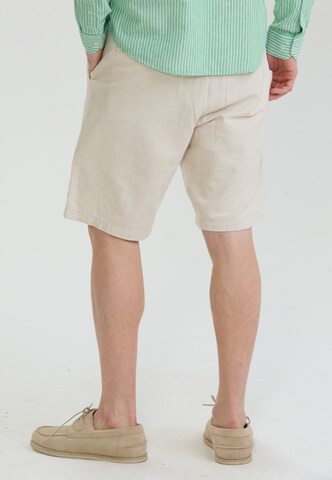 Felix Hardy Slim fit Trousers in Bronze