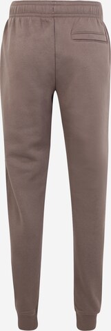 UNDER ARMOUR Tapered Workout Pants 'Rival' in Brown