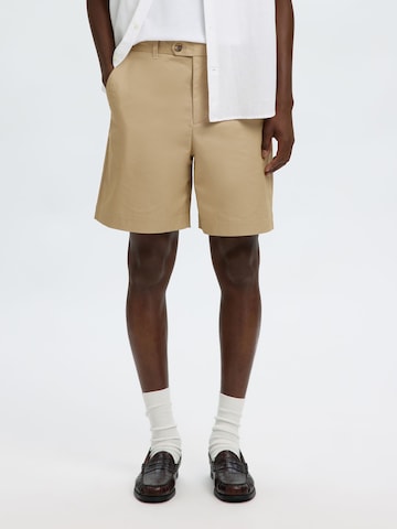 SELECTED Chino trousers in Brown: front