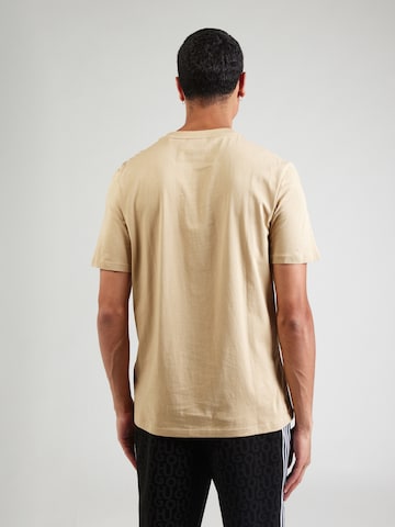 Tricou 'Dapusi' de la HUGO pe bej