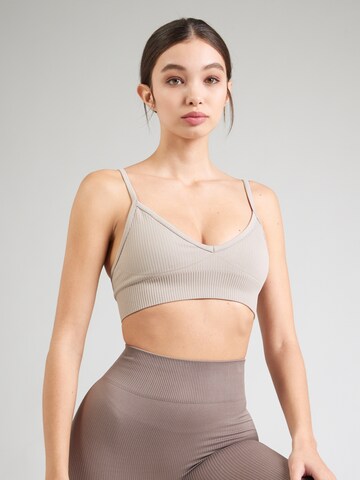 Aim'n Бюстье Спортивный бюстгальтер 'Ribbed Seamless' в Бежевый: спереди