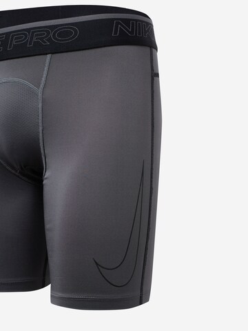 NIKE - Skinny Cueca desportiva em cinzento