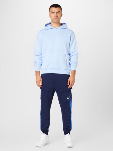 Nike Sportswear Tapered Hose in Blau