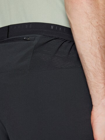 NIKE Tapered Workout Pants 'STRIDE' in Black