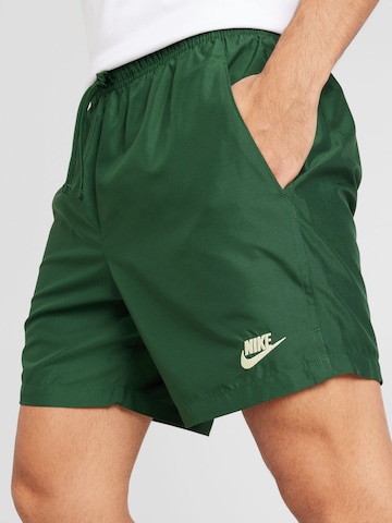 žalia Nike Sportswear Standartinis Kelnės