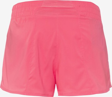 NIKE Loose fit Workout Pants in Pink