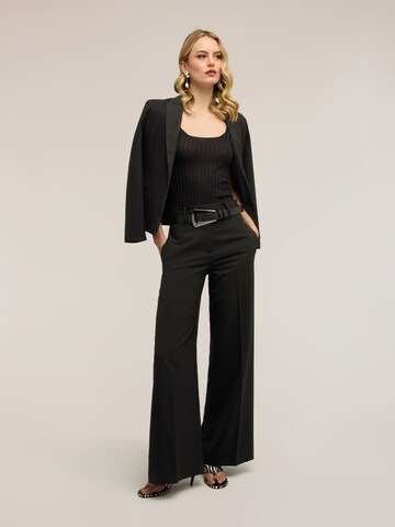 Top in maglia di MOTIVI in nero