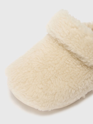 Pantoufle 'Classic Cozzzy' Crocs en beige