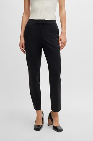 Coupe slim Pantalon à plis 'Tobaluka10' BOSS en noir : devant