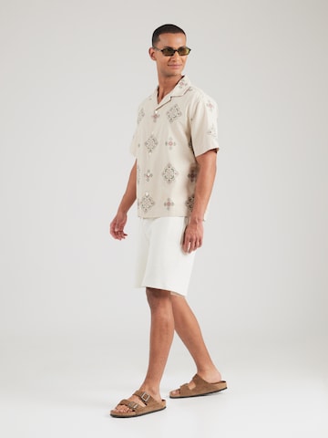 balta Abercrombie & Fitch Patogus modelis Marškiniai