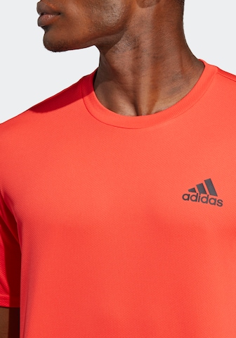 ADIDAS SPORTSWEAR Функционална тениска 'Designed For Movement' в оранжево