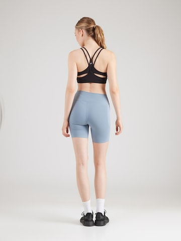 UNDER ARMOUR - Skinny Pantalón deportivo 'Motion' en azul