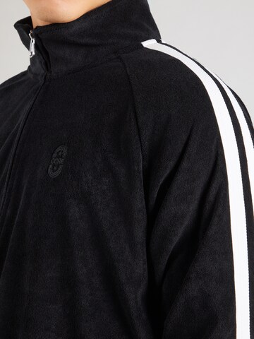 JACK & JONES Välikausitakki 'JCOATHLETICO' värissä musta