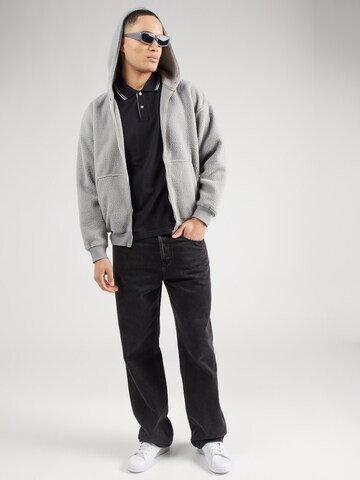 Maglietta di Champion Authentic Athletic Apparel in nero