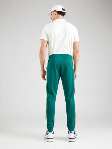 ADIDAS ORIGINALS Конический (Tapered) Штаны 'Adicolor Classics Sst' в Зеленый