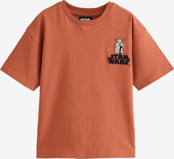 Next Shirt in Oranje: voorkant