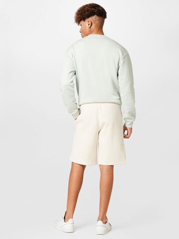 regular Pantaloni 'Adicolor Essentials Trefoil' di ADIDAS ORIGINALS in beige