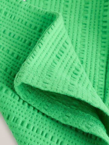 Next Zvonové kalhoty Kalhoty – zelená