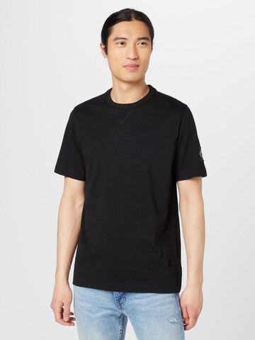 T-Shirt Calvin Klein Jeans en noir : devant