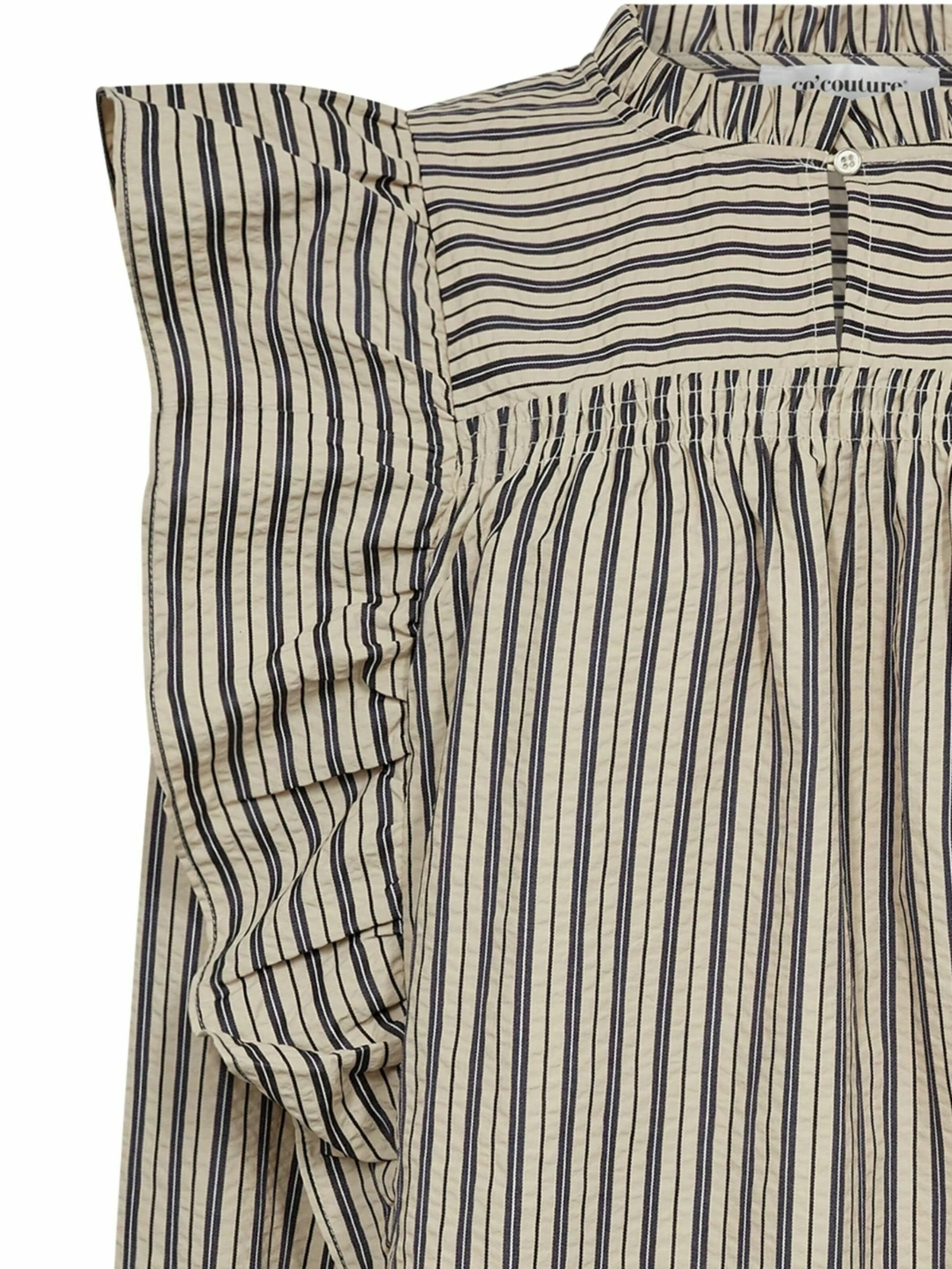 Chemisier co'couture en beige