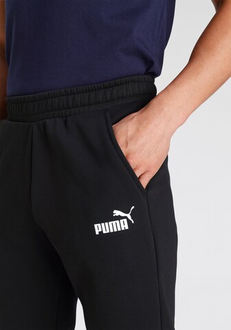 PUMA Tapered Sporthose 'Essentials' in Schwarz