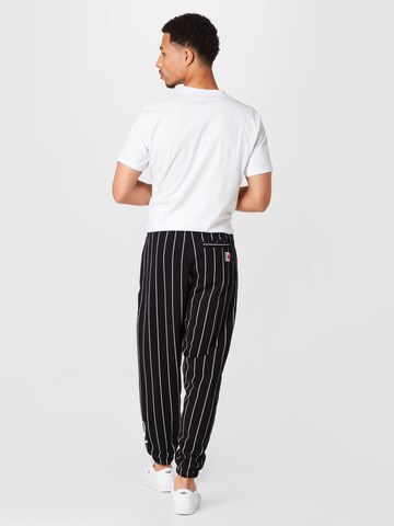 Tapered Pantaloni de la Karl Kani pe negru