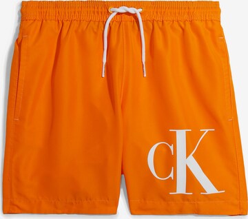 Calvin Klein Swimwear Board Shorts in Orange: front