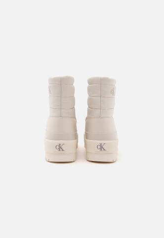 Calvin Klein Сноубутсы в Бежевый