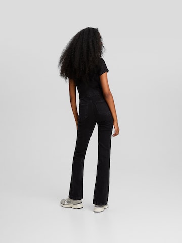 Tuta jumpsuit di Bershka in nero