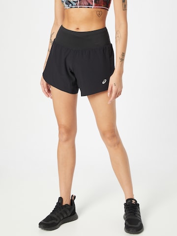 Loosefit Pantalon de sport 'Road' ASICS en noir : devant