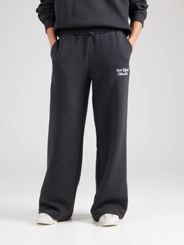 Wide leg Pantaloni di new balance in nero: frontale